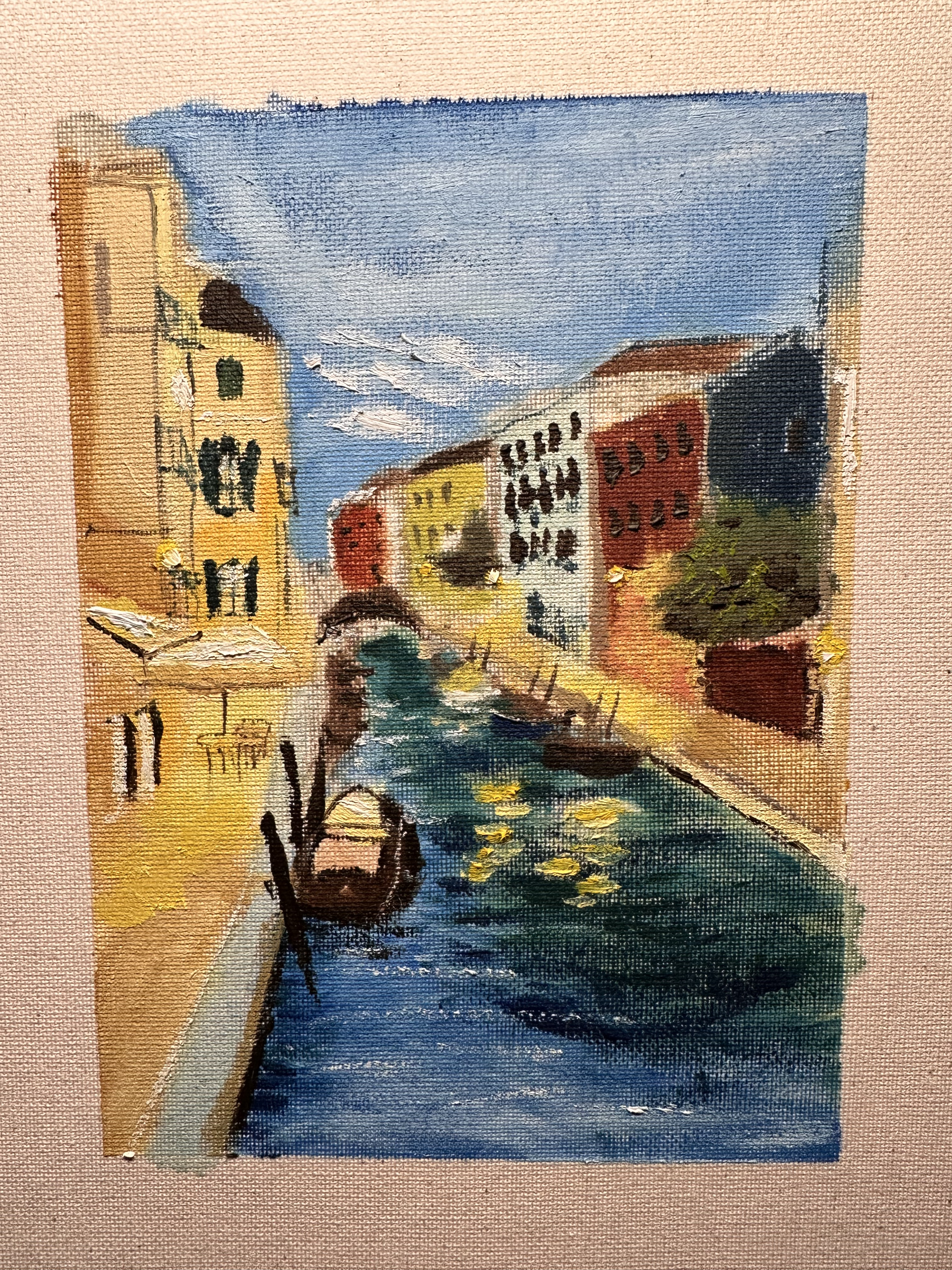 An oil painting of looking down a canal in Venice at dusk. The sky and water make blue the dominant color, but the left bank has bright yellows and tans due to lights.